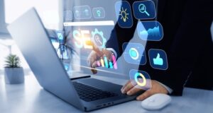 A person types of a computer, trying to understand how SEO will impact their property listings.